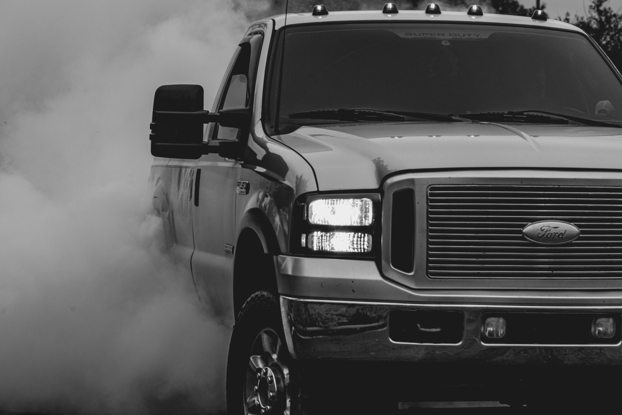 Diesel Truck Driving down a road